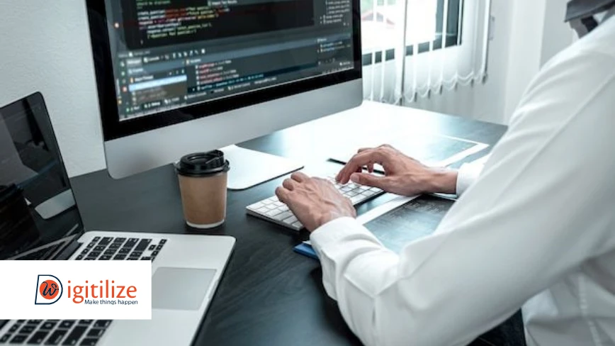 Developer coding on a desktop with focus