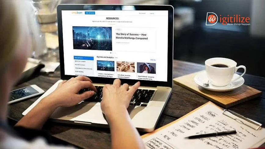Person browsing an online resource website on a laptop | DigitilizeWeb