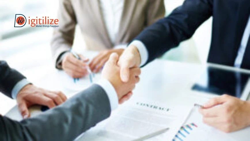 Business handshake with contract documents – Digitilize branding.